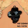 Máscara de aleación calavera electroforesis negro accesorios material al por mayor colgante DIY joyería cruz alas colgante negro