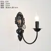 Lámpara de pared de vela retro, lámpara de pared candelabro de hierro forjado estilo campo americano, lámpara de mesita de noche estilo europeo para dormitorio, iluminación de pasillo o recibidor, adecuada para crear un ambiente acogedor en una casa de huéspedes