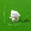 Figura de perro de picnic temática de primavera de dibujos animados creativos, una linda muñequita para paisajes en miniatura, decoraciones de bricolaje y pequeños adornos de escritorio
