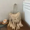 Bolso de Hombro Único Transfronterizo de Gran Capacidad Color Sólido 2026 PU con Borlas, Moda, Temperamento, Personalidad, Ambiente, para el Trabajo, Viajes, Debajo del Brazo