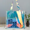 Bolsa Láser de PVC Bolso Transparente Personalizado Bolsa de Regalo Bolsa de Gelatina Colorida Bolsa de Plástico para Souvenirs con Logo Impreso
