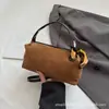 Bolsa de almofada retrô de camurça outono/inverno transfronteiriça para mulheres, novo estilo 2026, design único, bolsa de mão, bolsa de ombro, bolsa transversal