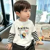 Camiseta de manga larga de dos piezas simuladas para niños, colección de otoño 2026 primavera y otoño, algodón puro, camiseta básica a rayas informal para niños mayores