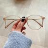 Los lentes anti-luz azul de Xiaohongshu se pueden equipar con armazones para miopía color marrón frío para mujer, de armazón redondo y transparentes planos para hombre