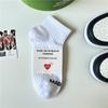 Calcetines blancos y negros de primavera y otoño para hombre, calcetines de tubo de color liso con red de abeja para masaje de pies, calcetines largos transpirables de tubo para estudiantes, calcetines deportivos de baloncesto