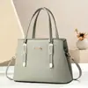 Fabricante de productos de alta demanda transfronterizos para comercio exterior Taizhou Bolso de Mujer 2025 Nuevo Bolso Tote Sencillo de Mano Versátil Bolso de Hombro Cruzado