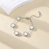 Pulseira Popular Transfronteiriça Flor de Cinco Folhas Aço Titânio Dupla Face para Mulheres, Joia Versátil na Moda, Fashion, de Alto Padrão e Luxo Leve