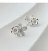 Novos brincos de flor com zircônia transparente em estilo feminino, luxo leve, brincos requintados de alta qualidade, brincos de designer para mulheres atacado