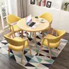 Conjunto de mesa e cadeiras para negociação loja comercial recepção reunião mesa redonda pequena área de descanso simples casual uma mesa quatro cadeiras mesa de jantar
