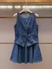 Shenzhen Nanyou Moda Femenina de Gama Alta Verano Nuevo de Moda Chaleco de Mezclilla Adelgazante + Conjunto de Falda