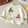 Camiseta infantil de manga comprida, coleção outono 2026, estilo unissex para meninos e meninas, com estampas de desenhos animados estilo japonês, adequada para bebês e crianças pequenas, casual e versátil