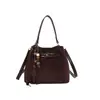 Bolso Súper Caliente Estilo Nicho para Mujer 2026 Nuevo Bolso Cruzado Versátil Bolso de Mano Pequeño Exquisito para Salir Bolso Tote Tipo Cubo