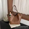 Gran Capacidad Viajes de Negocios Gama Alta Nicho Nuevo Llegado Otoño 2026 para Mujer Estilo Retro Japonés Coreano Bolso de Hombro Único Bolso de Mano