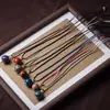 Transmisión en Vivo Venta al por Mayor Diseño de Artesanía en Laca Collar de Cuerda Tejido a Mano, Colgante de Juguete Cultural, Pulsera de Cuentas de Laca al por Mayor