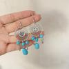 Pendientes colgantes de piedra de pino de estilo nacional retro bohemio europeo y americano transfronterizos, pendientes con borlas huecas, venta directa de fábrica