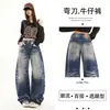 Pantalones unisex YKK retro americano lavados con diseño de salpicaduras azules desgastados, holgados, de alta costura, con corte curvo