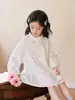 Ropa para niños Tongxingyuan, vestido morado de primavera y otoño con flores para bebé, nuevo vestido elegante y moderno 2026 para niñas