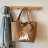 Versão Coreana da Bolsa de Lona Ins Gato Fofo de Grande Capacidade para Mulheres 2026 Novo Modelo Bolsa de Ombro Casual para Estudantes, Sala de Aula, Deslocamento