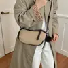 Bolsa de antebraço color block para mulheres, nova coleção outono 2026, bolsa dumpling de alta qualidade, bolsa versátil de ombro e transversal color block retrô de nicho