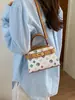 Moda Transfronteriza Versátil Gran Capacidad Primavera 2026 Nuevo Bolso de Hombro Cruzado de Moda con un Toque de Alta Gama y Bolso Cubo de Mano