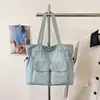Bolso de lona de mezclilla de gran capacidad para mujer, nuevo modelo 2026, bolso de mano de viaje práctico con múltiples bolsillos, bolso de hombro para el trabajo