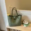 Bolso de paja de gran capacidad para mujer, estilo transfronterizo, para ir al trabajo, nuevo de verano 2026, popular, bolso de mano de un solo hombro, bolso de axila