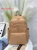Chi Bao 2025 Nova Mochila Multicor em Tecido Oxford Moda Simples Bolsa Feminina Grande Capacidade Mochila de Montanhismo 3078-PS