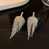 Brincos de Borla com Folha Exagerada Cravejada de Diamantes Estilo Europeu e Americano Femininos High-end para Jantar Super Brilhantes Brincos de Luxo Leve Distintivos