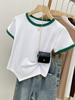 Camiseta de algodón de manga corta con hombros descubiertos para mujer, diseño irregular y elegante, top corto con contraste de color.