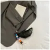 Halter Neck Diseño Nicho Lindo Bolso Croissant Tendencia Moda Estilo Mini Color Sólido Simple Textura Empalmada Bolso Cruzado