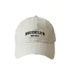 Gorra de béisbol bordada con letras estilo ins coreano para mujer, adecuada para primavera y otoño, simple y versátil, gorra casual de ala ancha que hace que la cara se vea más pequeña