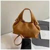 Bolso altamente elegante y único 2026 nueva moda bolso nube relajado nicho moderno color sólido plisado bolso cruzado