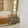 Bolsa de ombro estilosa estilo moto para mulheres, novo modelo 2026, bolsa de mão para o dia a dia, pequena bolsa tote para sair para o trabalho, bolsa baguette