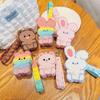Monedero con llavero de Sanrio con dibujos animados, minibolso de almacenamiento para auriculares, regalo al por mayor