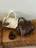 Almohada para bolso súper popular de nicho para mujer, nuevo modelo 2026 mini bolso Boston acolchado, bolso de hombro y bandolera de moda