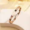 Pulseira de titânio e aço de alta qualidade com diamantes pulseira de aço inoxidável ouro 18k real galvanoplastia em forno pulseira feminina que abre