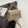 Bolso de mano de alta gama para mujer, primavera y verano 2024, nuevo bolso Kelly informal de moda, bolso cruzado de estilo coreano, combinable con todo.