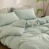 Juego de cuatro piezas de algodón 100% teñido en hilo y lavado, algodón puro, sin marca, suministrado por el fabricante, funda de edredón de alta calidad, sábana bajera de estilo japonés, ropa de cama al por mayor