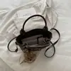 Venta al por mayor transfronteriza 2026 nueva bolsa cruzada de nicho, bolso de mano pequeño de alta gama, bolso para teléfono de lunares, bolso de hombro