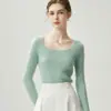 Moda Otoño e Invierno Nueva Elegante Estilo Puro Deseo Suéter de Cachemir Tejido de Punto Redondo Grande Ajustado para Mujer Suéter Ajustado Capa Base