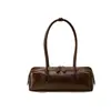 2026 Nova Bolsa de Couro de Vaca Couro Genuíno Bolsa de Ombro Moda Europeia e Americana Bolsa Baguete Design de Nicho Bolsa de Mão Bolsa Feminina