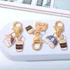 Lindo Colgante de Gato de Metal para Café Llavero Corazón de Niña Antiperdido Estuche para Auriculares AirPods Colgante Decorativo para Memoria USB