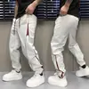 Atacado de Fábrica Calças Casuais Elásticas Listradas Novas Joggers Masculinos Color Block Soltos Esportivas à Prova de Vento Casuais
