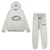 Nueva Sudadera con Capucha Casual Suelta Unisex Fear of God Essentials con Letras Afelpadas Moda