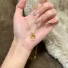 Novo Colar de Moeda Carrossel para Mulheres, Anel Rotativo em Formato de Coração Dourado Vintage com Pedras Totais, Cavalo de Balanço Listrado, Gargantilha Retrô