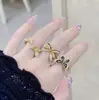 Anillo Nuevo de Esmalte Vintage con Lazo de Cinta para Mujer Versátil Nicho Alto Gama Anillo para Dedo Índice de Mariposa