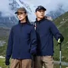 Chaqueta cortavientos e impermeable con forro de forro polar hecha a medida, con cuello alto, que presenta logotipos impresos, adecuada para ropa de trabajo al aire libre y uniformes corporativos para primavera y otoño