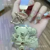 Edição Limitada de Ano Novo Urso de Rosa Pingente de Ouro Puro Corrente para Celular Chaveiro Dourado Loja de Ouro Presente Comercial