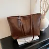 Bolso de mano grande de cuero encerado para mujer, nuevo bolso de hombro de moda 2025, bolso de mensajero elegante y versátil