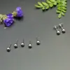 Estilo japonês e coreano novo brincos de aço inoxidável furos na orelha pinos de orelha simples contas redondas brincos de touca fabricantes femininos atacado